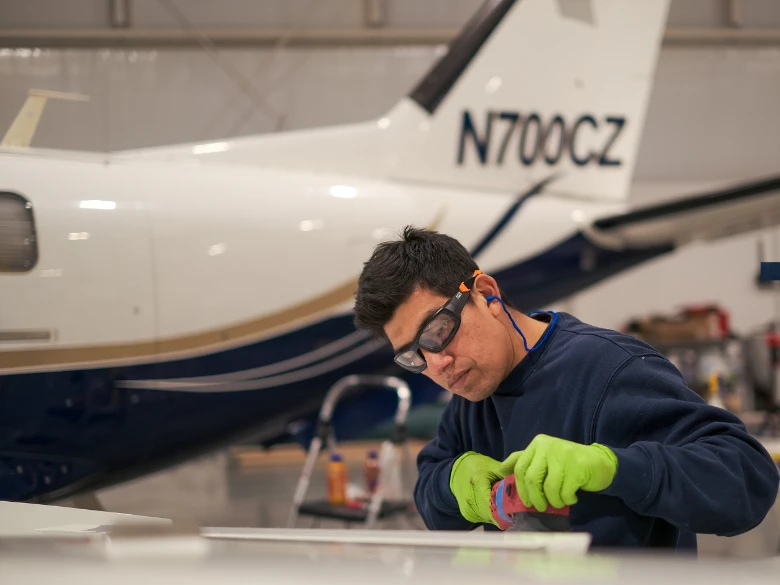 Jaime polishing a TM700 turbo prop in Sandpoint, Idaho