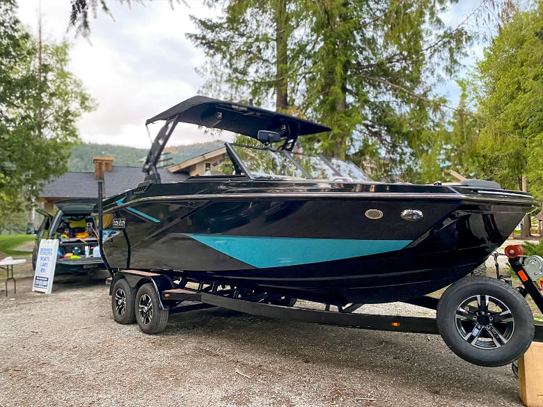 Marine Services black boat detailed by Bonner mobile detailing
