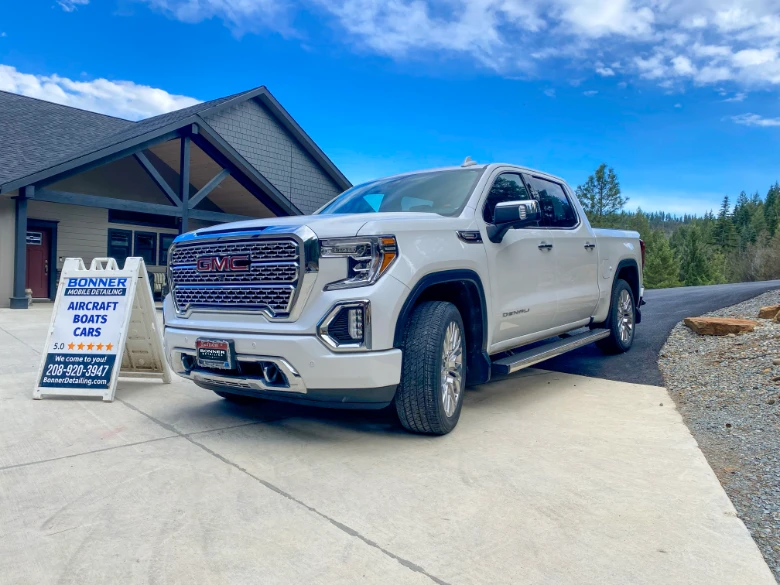 Shiny and clean GMC Denali pickup truck after thorough detail