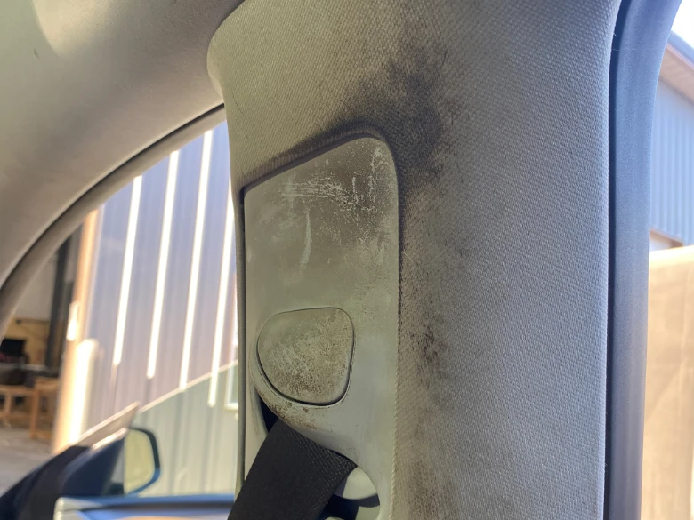 dirty seatbelt area before